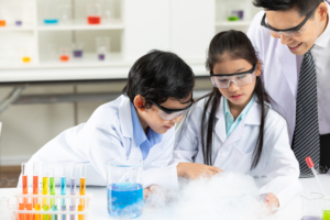 Child,Students,Doing,Or,Testing,A,Chemical,Experiment,With,Science